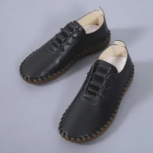 Women's soft leather hollow lace up flat shoes
